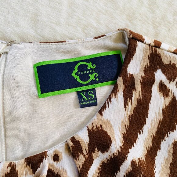 Women's Leopard Print Peplum Sleeveless Top Size XS Excellent Condition - Picture 9 of 10